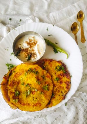 A picture of Leftover Poha Chilla with fresh Veggies.
