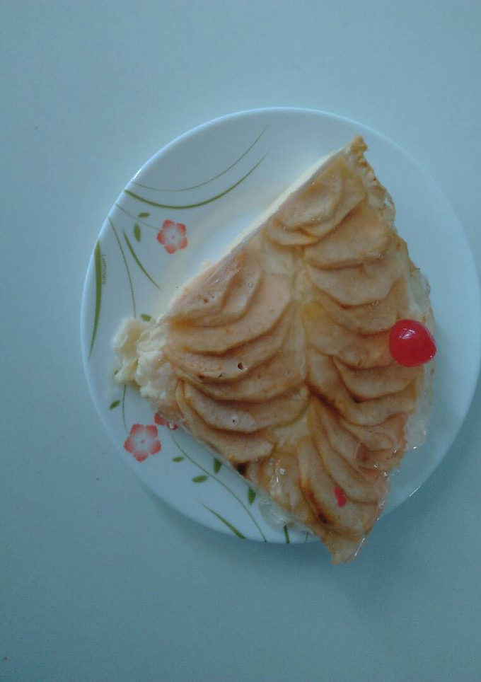 Una foto de Tarta de manzana con crema pastelera