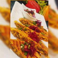 A picture of Spicy sprouts masala sandwich.