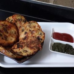 A picture of Leftover rice mini uttapam.
