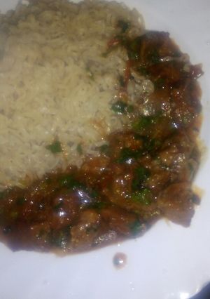 A picture of Stewed beef with rice.