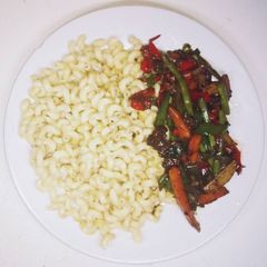 A picture of Macaroni and beef stir fry sauce.
