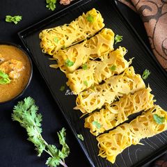 A picture of Roti Jala (Malaysian Net Pancakes / Crepes).