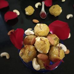 A picture of Kesaria Poha/Avail Ladoo.