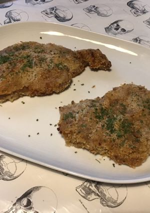 Une photo de Côtes de porc marinées panées