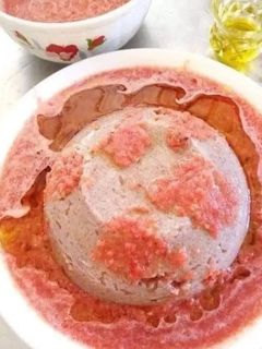 صورة لوصفة عصيده سودانيه بزبده الفول والطماطم