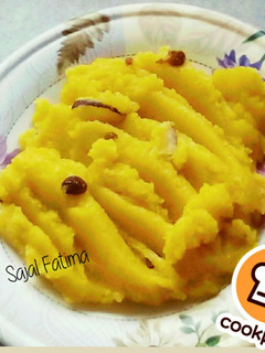 A picture of Sooji ka thin halwa (semolina halwa).