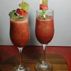 A picture of Water melon and kiwi punch.