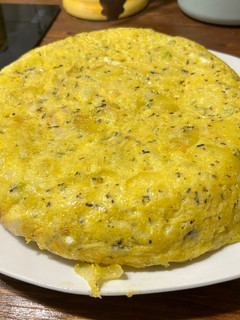 Una foto de Tortilla de patata trufada