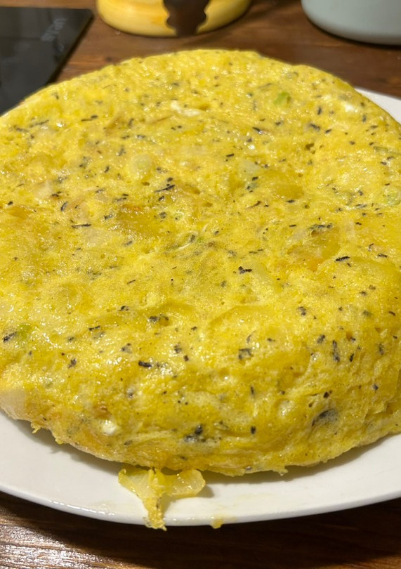 Una foto de Tortilla de patata trufada