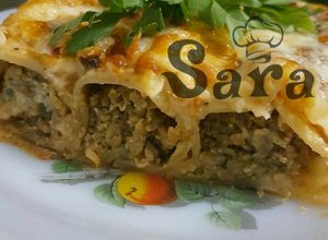 صورة لوصفة مكرونة كانيلوني بصوص الطماطم والبشاميل