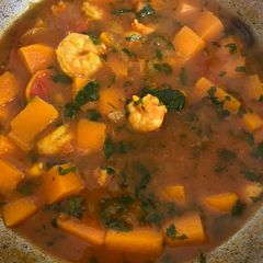 A picture of Prawn curry with butternut squash.