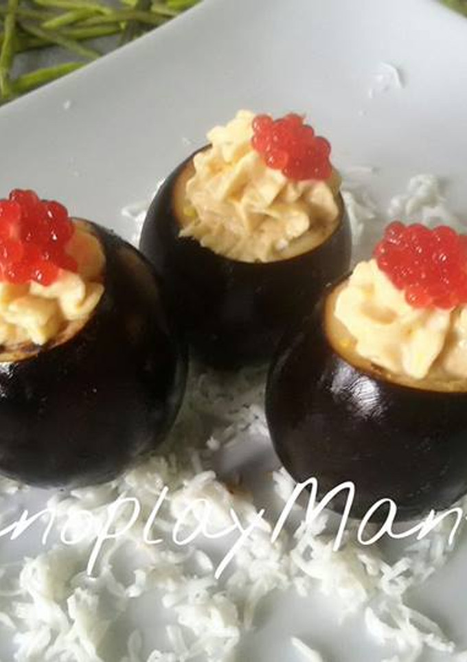 Una foto de Huevos negros rellenos en GME, F y G y Tradicional