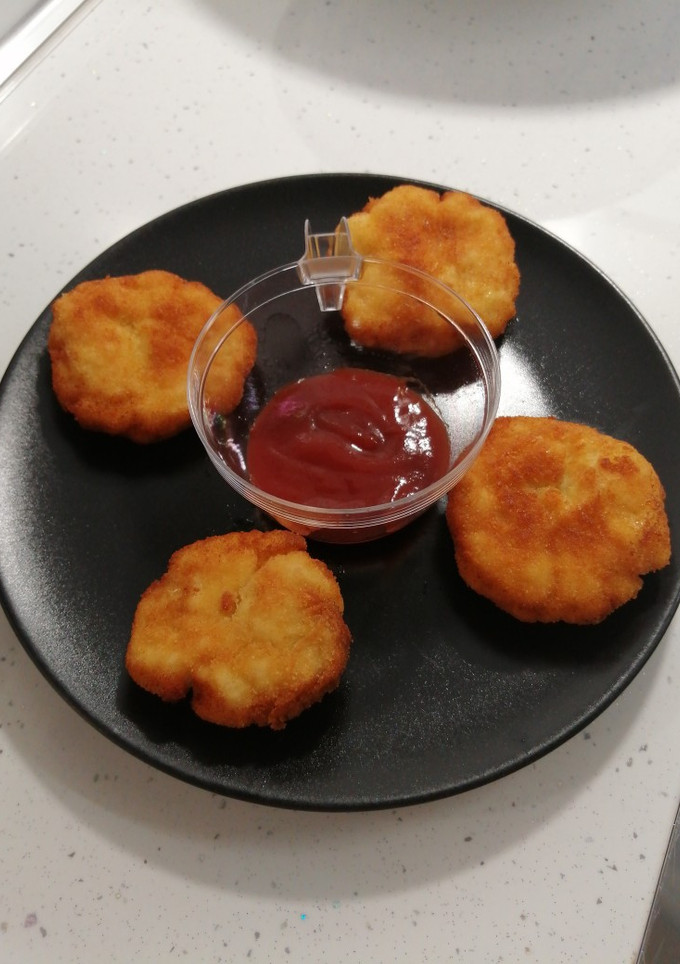 Una foto de Nugget de pollo con toque al curry