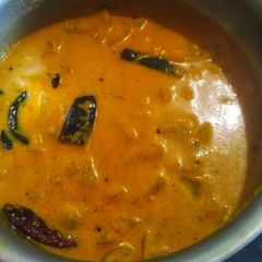 A picture of Snake gourd theeyal Kerala style.