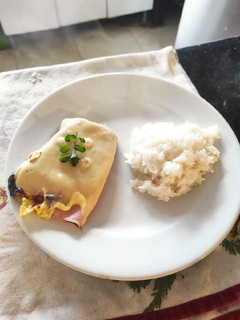 Una foto de Cerdo al horno con jamón y queso