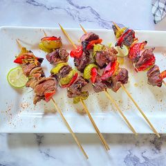 A picture of Beef kebabs/ stick meats.