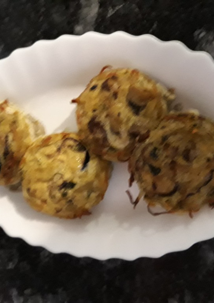 Una foto de Nidos de patata y verduras