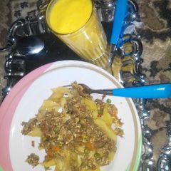 Chips and veggie scramble egg with mango smoothie A picture of Chips and veggie scramble egg with mango smoothie.