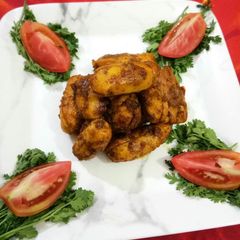 A picture of Stuffed arbi with dry spices.