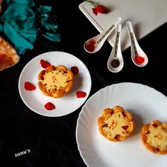 A picture of Kesar Pista Rabdi in Balushahi Flower Cups.