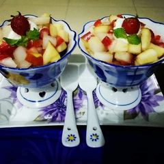 A picture of Fruit Chaat🍌🍎🍋🍓.