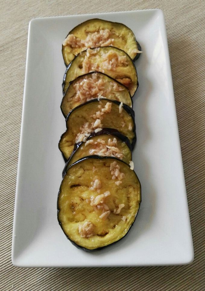 Una foto de Berenjena frita con vinagre y ajos