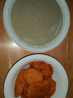 A picture of Pap made with millet and Akara(beans cake).