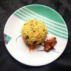 A picture of Mango rice mavinakayi chitanna.