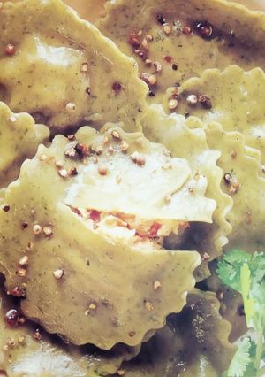A picture of Mint Bottle Gourd Ravioli with Pumpkin and cheese filling.