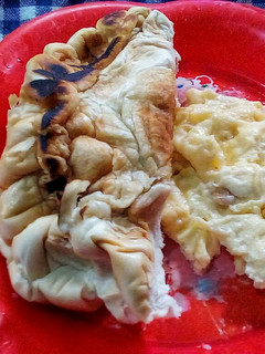 A picture of Fried bread and omellete.