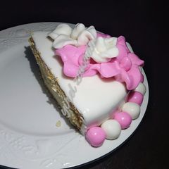 A picture of Pineapple cake with fondant icing.