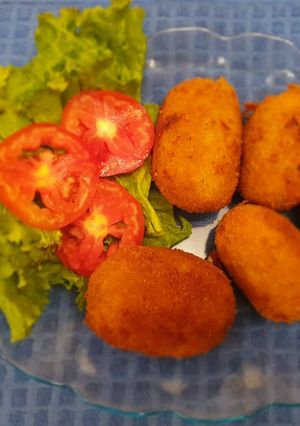 A picture of Chicken tikka bread rolls.
