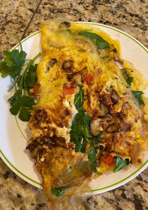 Hình của món Trứng chiên nấm, ớt và spinach.