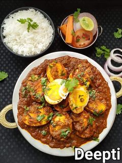 मसालेदार अंडा तवा मसाला (anda tawa masala recipe in marathi) रेसिपी चे मुख्य फोटो