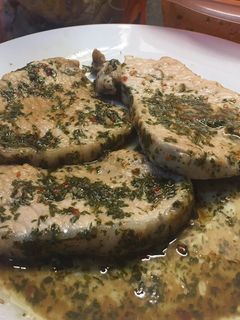 Una foto de Lomo de cerdo con salsa chimichurri 🇦🇷
