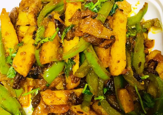 Stir fried potatoes capsicum