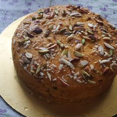 A picture of Alphonso mango sooji dry fruits cake.