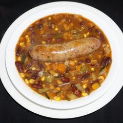 A picture of Red kidney beans soup with vegetables and Italian sausages.