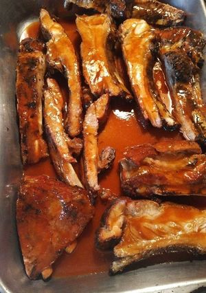 A picture of Grilled Ribs with Slobber Knocker sauce.