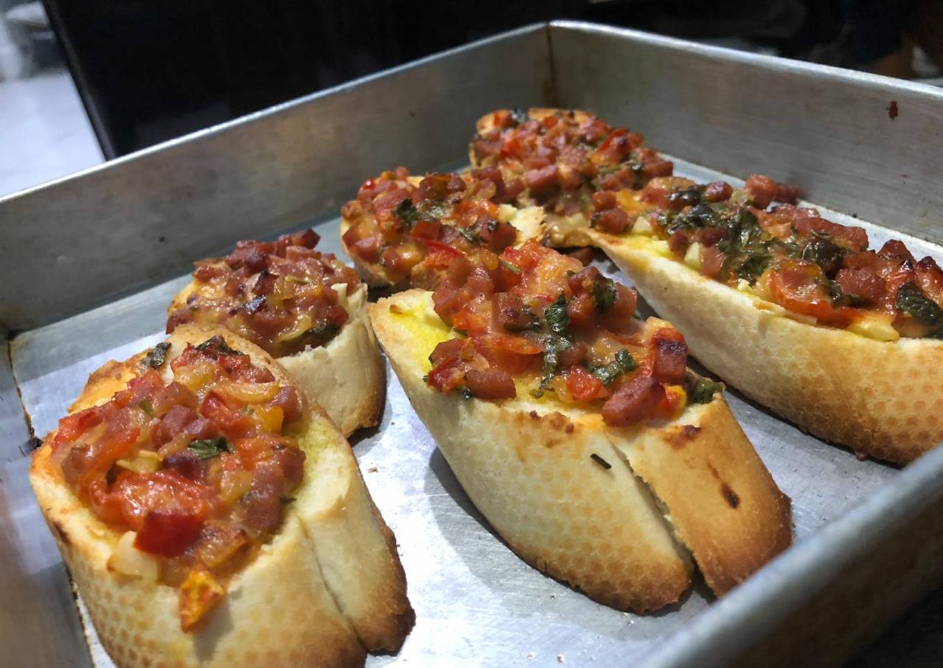 Bruschetta with tomato and beef