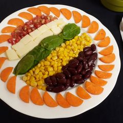 A picture of Caprese salad with Indian flavour.