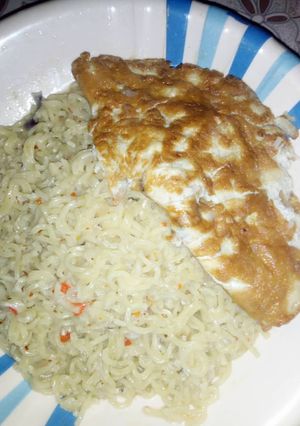 A picture of Indomie and fried egg.