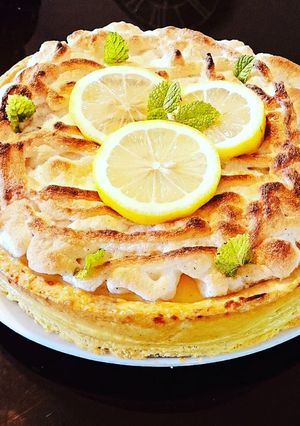 Une photo de Tarte citron praliné meringuée