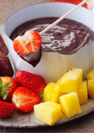 A picture of Chocolate fruits fondue.