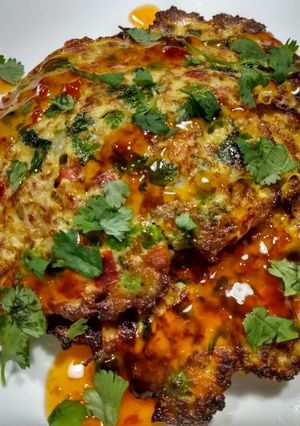 A picture of Filipino pork torta with chili maple sauce.