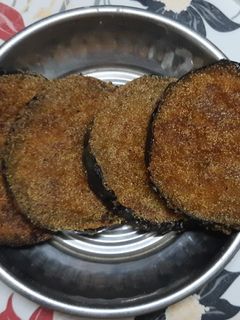 वांग्याचे कुरकुरीत काफ (Vangyache Kaap Recipe In Marathi) रेसिपी चे मुख्य फोटो
