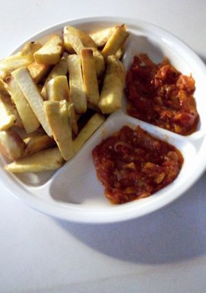 A picture of Fried sweet potatoes and stew.