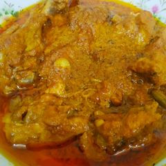 A picture of Badami chicken qorma.