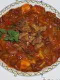 Porotos rojos con vegetales y chicharrones